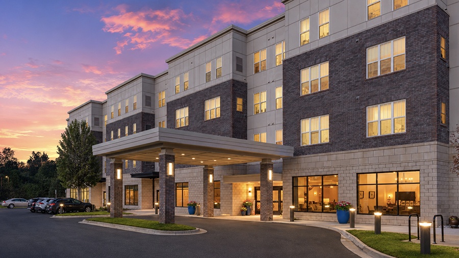Front Entrance in the evening at American House Meridian Township, a senior living community