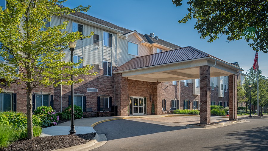 Front entrance at American House Sterling Woods Senior Living Community in Sterling Heights