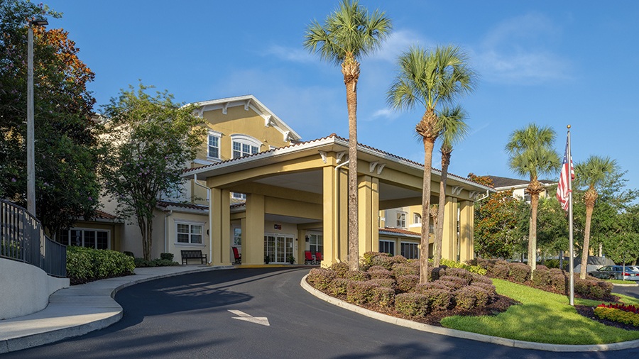 Driveway and entrance to American House assisted living and memory care facility in Zephyrhills, FL