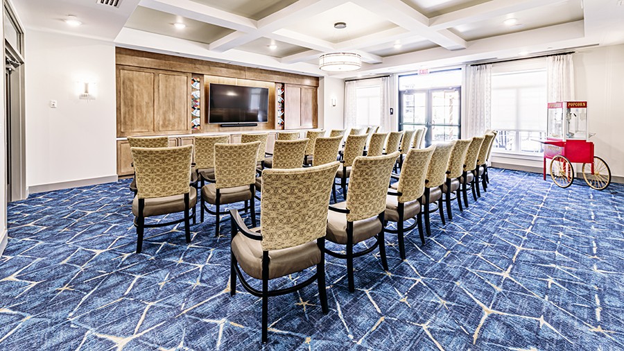 Movie theater at American House Mount Prospect assisted living and memory care facility in Mt. Prospect, IL