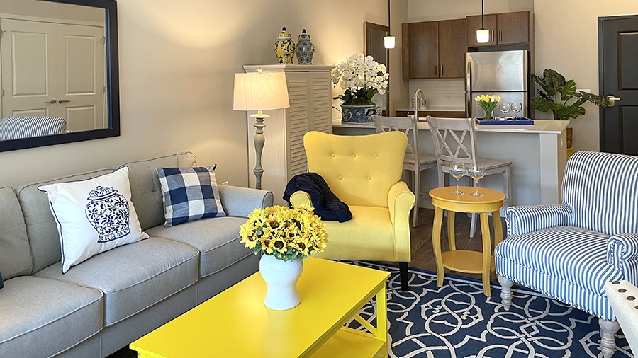 Kitchen and family room in an apartment at American House Oak Park, a luxury assisted living community in Oak Park, Illinois