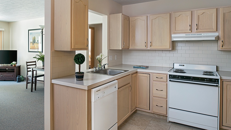 Senior apartment kitchen at American House campus in Spring Lake, MI