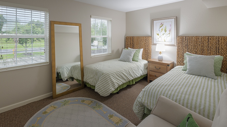 Bedroom at an apartment at American House assisted living and memory care facility in Zephyrhills, FL