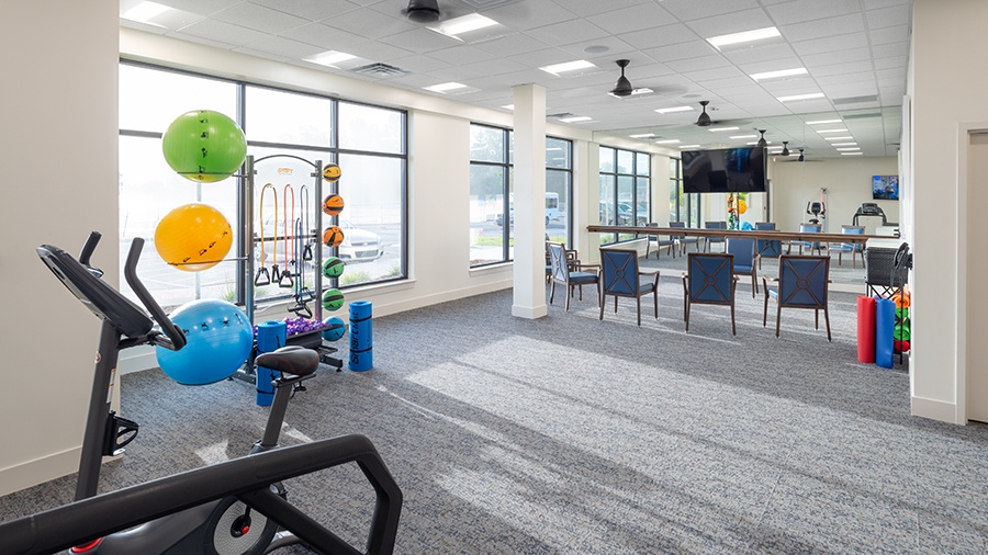 Fitness center at American House Meridian Township, a senior living community