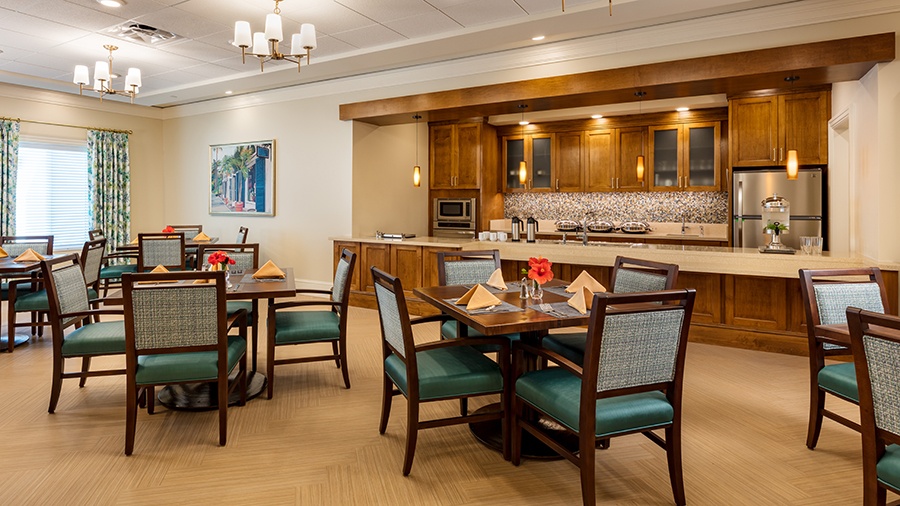 Memory care dining room at American House Naples assisted living and memory care facility