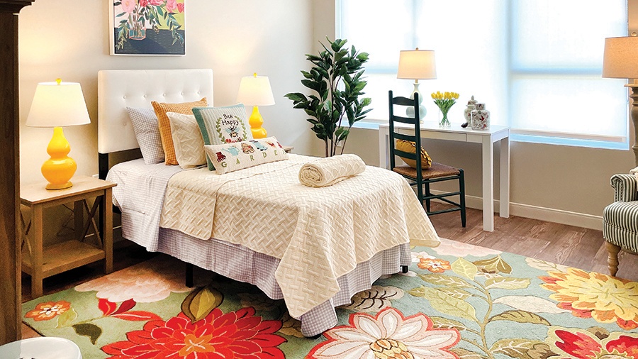 Bedroom in a memory care apartment at American House Oak Park, a luxury assisted living community in Oak Park, Illinois