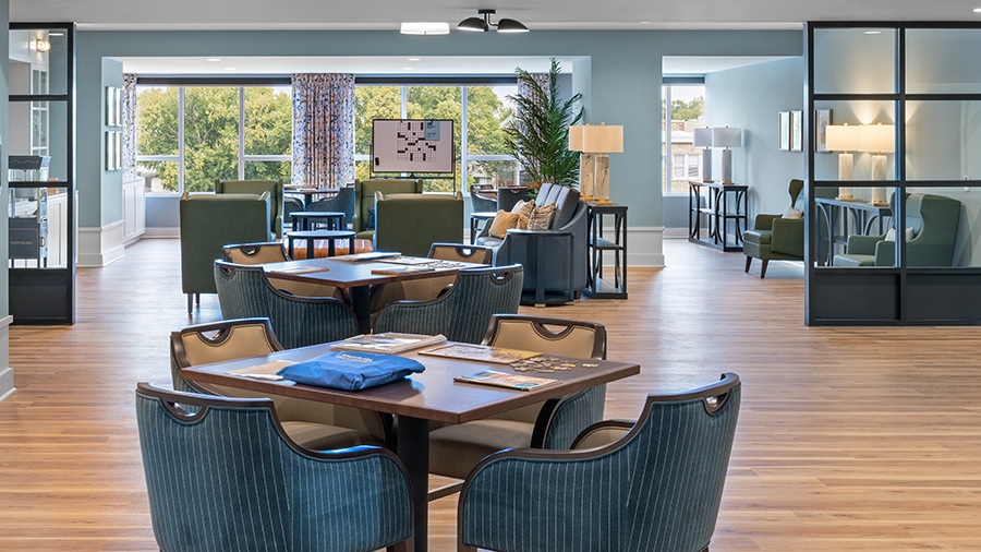 Game room with memory care activity stations at American House Oak Park, a luxury retirement home in Oak Park, Illinois