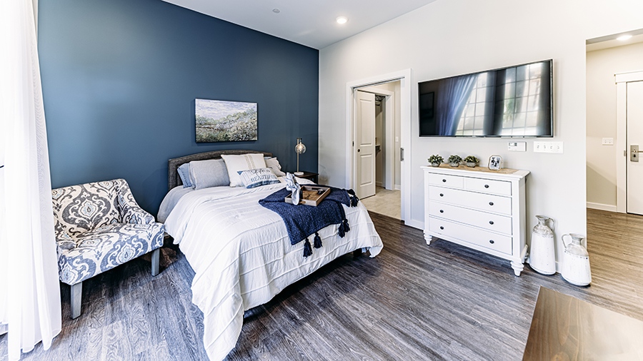 Bedroom in an apartment at American House Mount Prospect assisted living and memory care facility in Mt. Prospect, IL