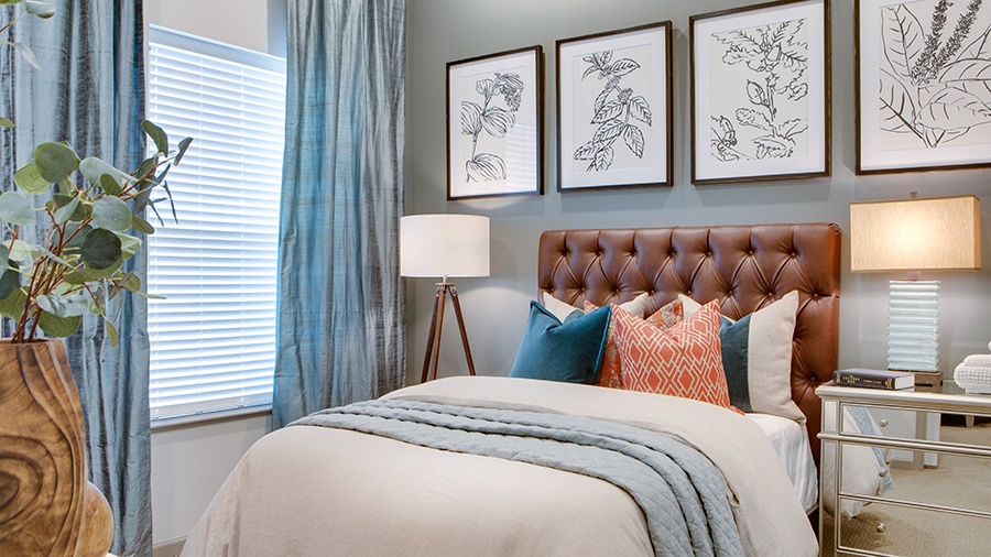Bedroom in an apartment at American House Town and Country memory care and assisted living facility in Town and Country, MO