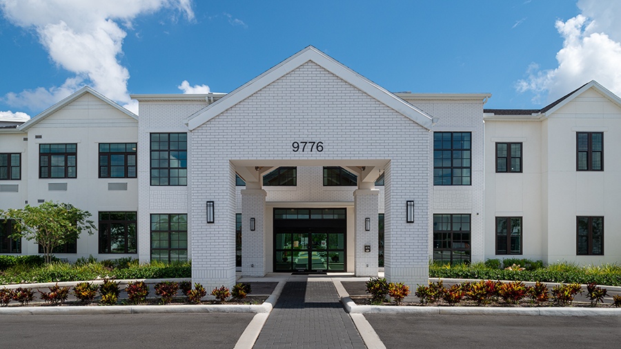 Driveway and entrance at American House Boynton Beach, a retirement home in South Florida
