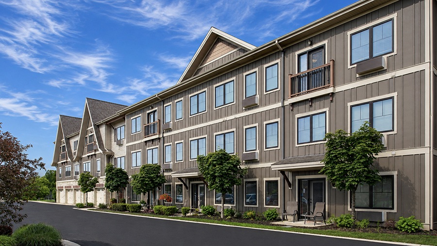Exterior view of American House Jenison senior living facility in Jenison, MI
