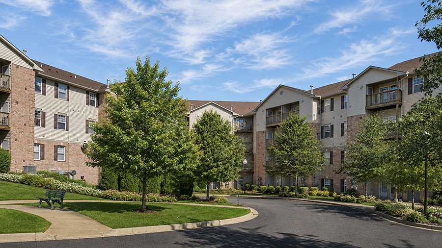 Driveway and front facade at American House Milford, a senior living facility in Oakland County, MI