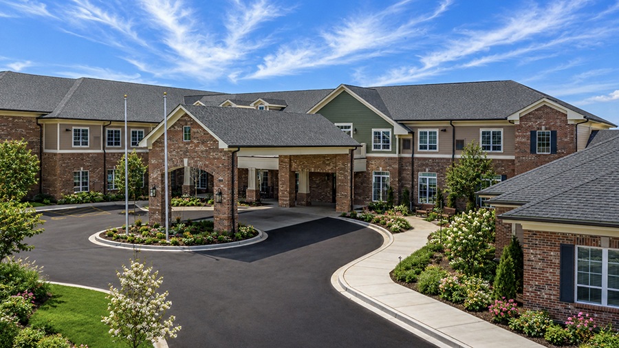 Front entrance and driveway at American House Mount Prospect assisted living and memory care facility in Mt. Prospect, IL