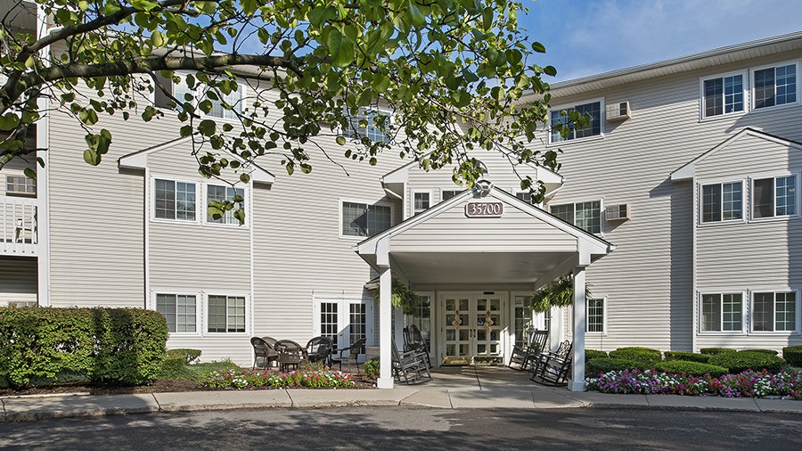 Exterior entry way into American House in central Westland, MI