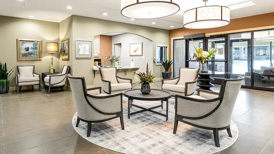 Lobby and concierge desk at American House St. Anthony's Independent Living, Assisted Living, and Memory Care senior living facility in Kansa City, MO
