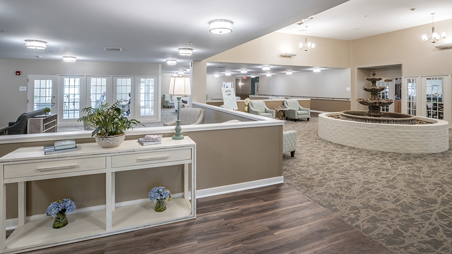 Front lobby with fountain at American House West Knoxville assisted living and memory care facility