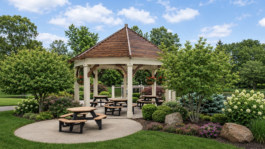 Gazebo with picnic tables at American House Jenison senior living facility in Jenison, MI