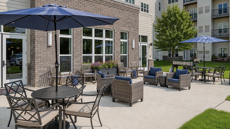 Terrace with seating at American House Meridian Township, a senior living community