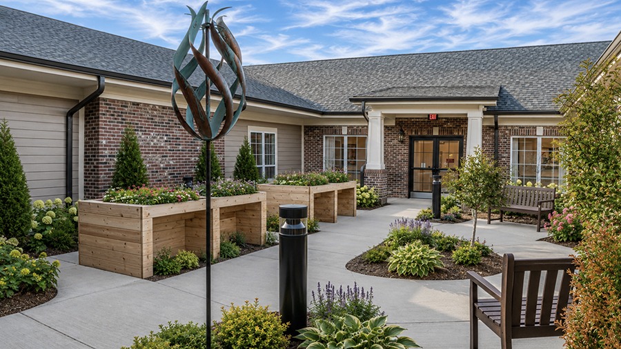 Patio seating and flowers at American House Mount Prospect assisted living and memory care facility in Mt. Prospect, IL