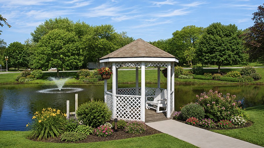 Gazebo and lake with fountain at American House retirement home Spring Lake, MI