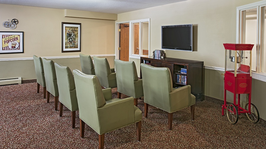 Theater with large chairs and popcorn maker in a home for the elderly in Northwest Westland, MI