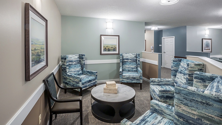 Cozy sitting room with comfy chairs at American House Kingsport Assisted Living and Memory care facility in Kingsport, TN