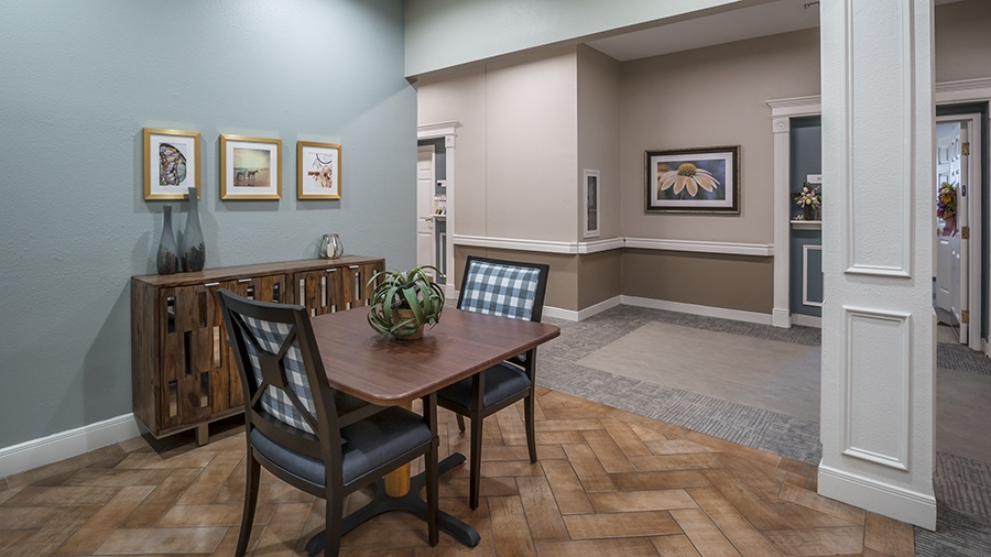 Common area and card table at American House Shallowford, a senior living community with assisted living and memory care in Shallowford, Tennessee