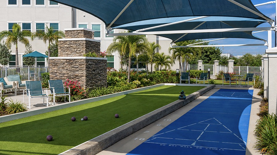 Shuffleboard at American House Ft. Myers assisted living and memory care facility in Fort Myers, FL