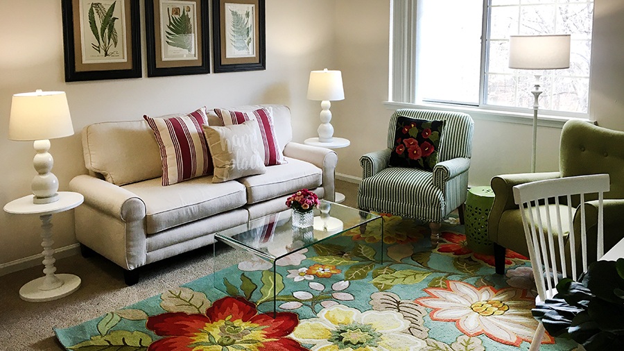 Living room in an apartment at American House Westland Joy, a senior living facility in Western Wayne County, MI