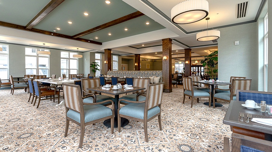 Restaurant style dining room at American House Meridian Township, a senior living community