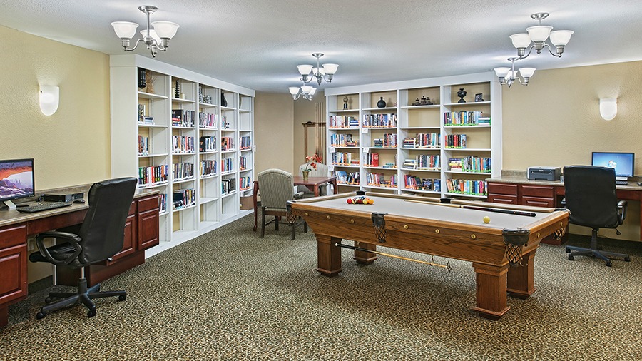 Activity room with billiards and computers at American House Milford, a senior living facility in Oakland County, MI
