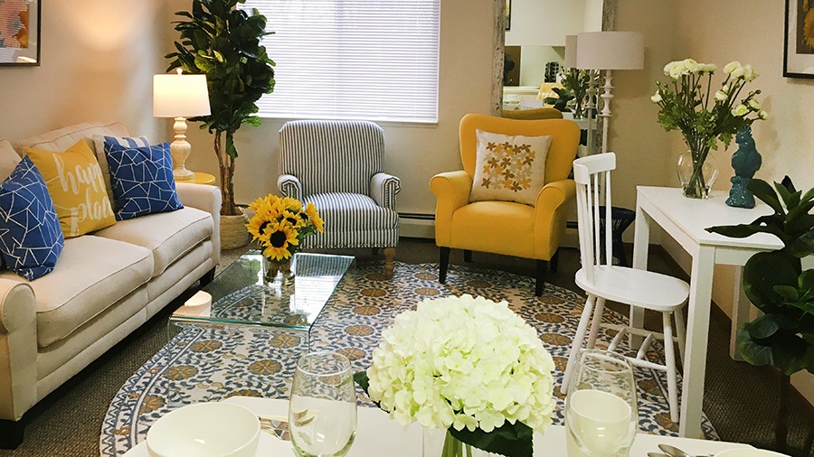 Living room in an independent living apartment at American House in Westland, MI.