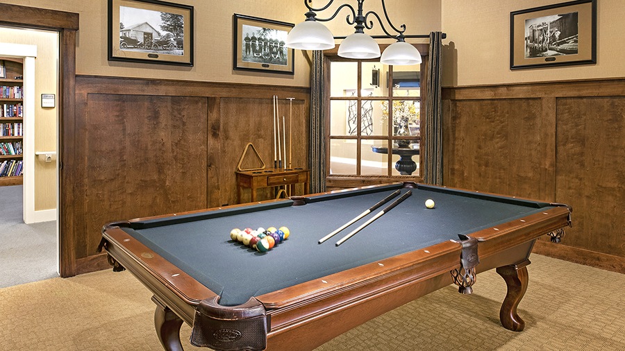 Billiard table in activity room at American House Jenison senior living facility in Jenison, MI