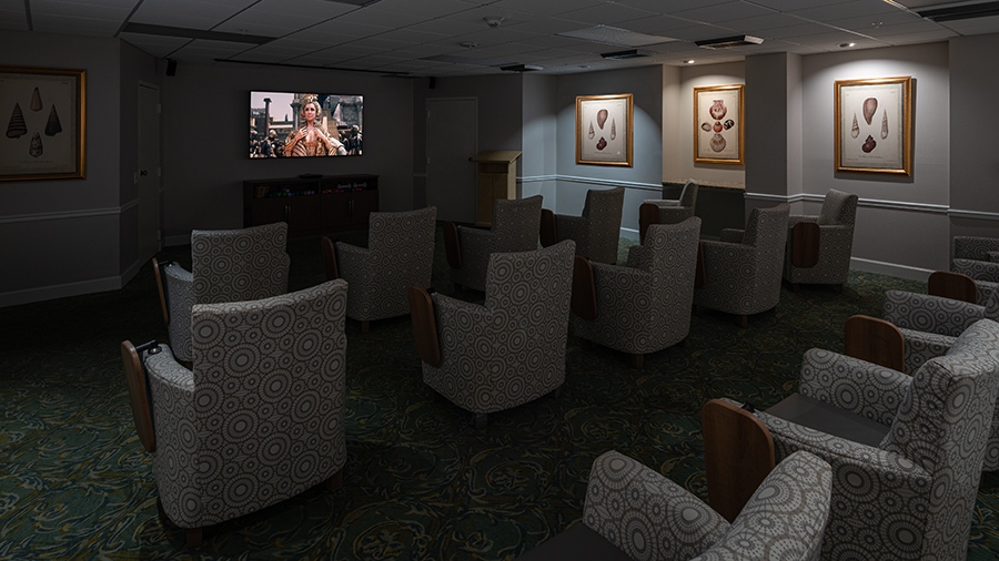 Movie theater at American House Sarasota Senior Living Community