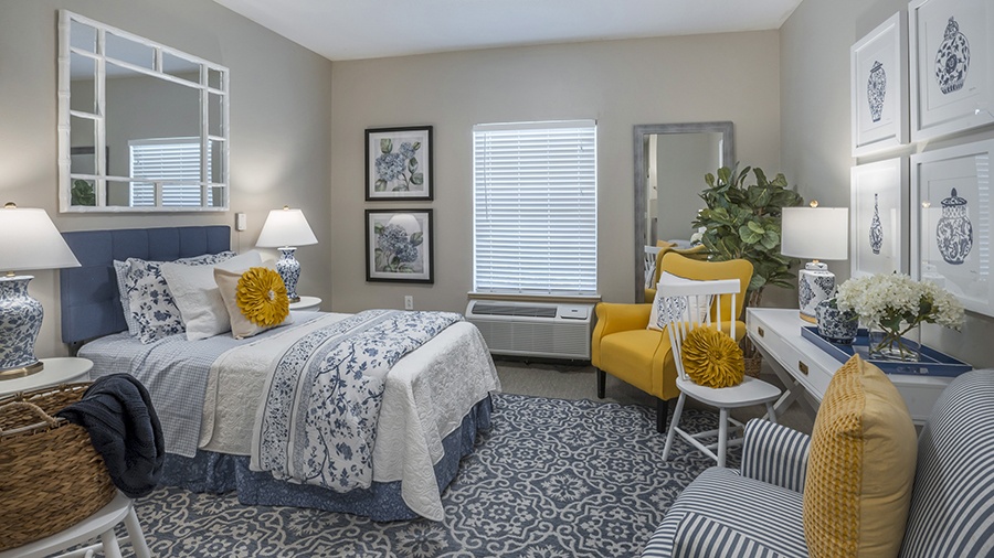 Bedroom in an apartment at American House Shallowford, a senior living community with assisted living and memory care in Shallowford, Tennessee