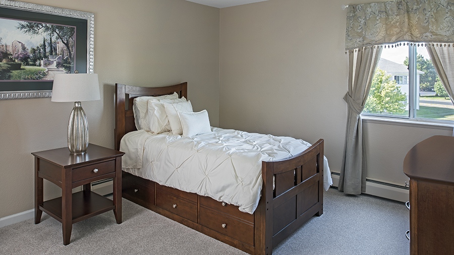 Bedroom with a view at American House convalescent home in South Sterling Heights, MI