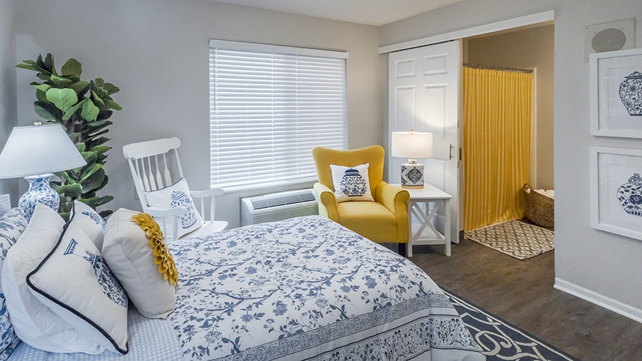 Bedroom in a model apartment at American House Lebanon memory care and assisted living facility in Lebanon, TN