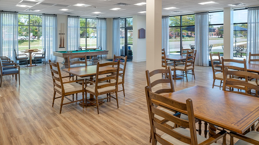 Game room with billiards at American House Meridian Township, a senior living community