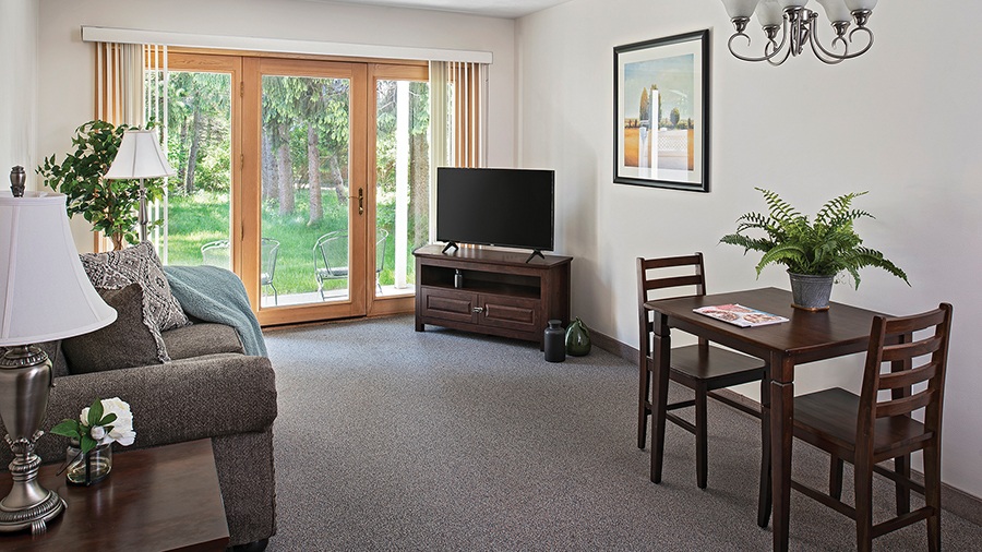 Living room in American House Senior Living apartment in Spring Lake, MI