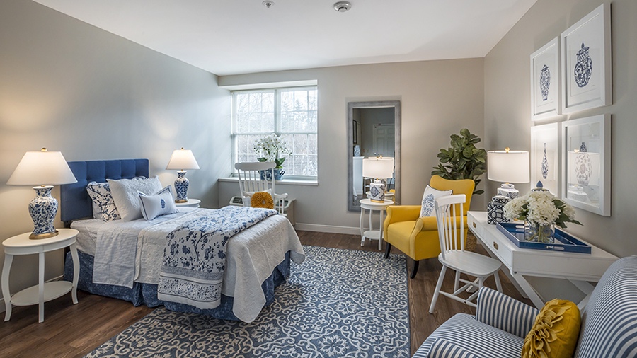 Bedroom in an apartment at American House West Knoxville assisted living and memory care facility