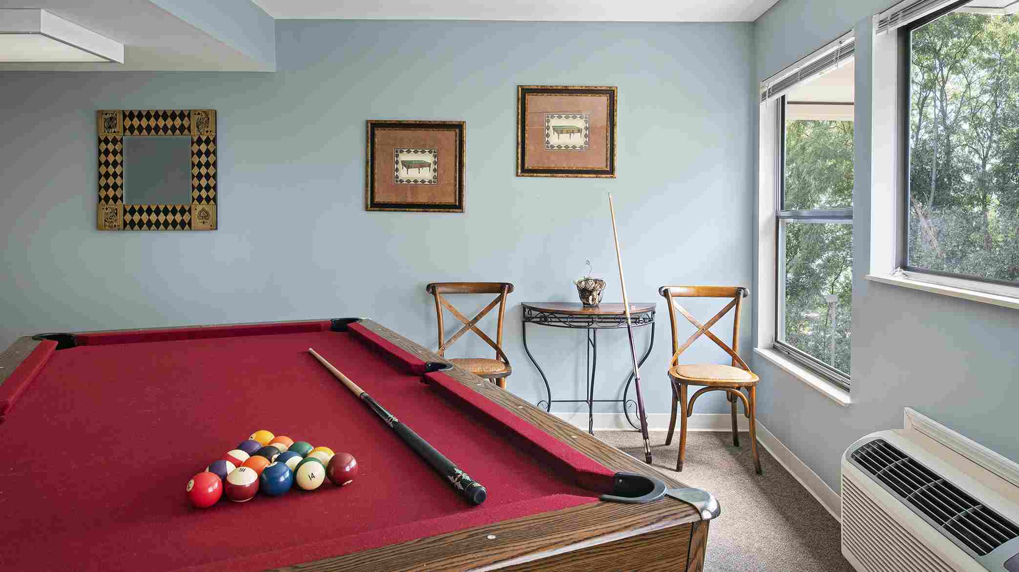 Game room with billiards at American House Carpenter independent and assisted senior living facility adsf