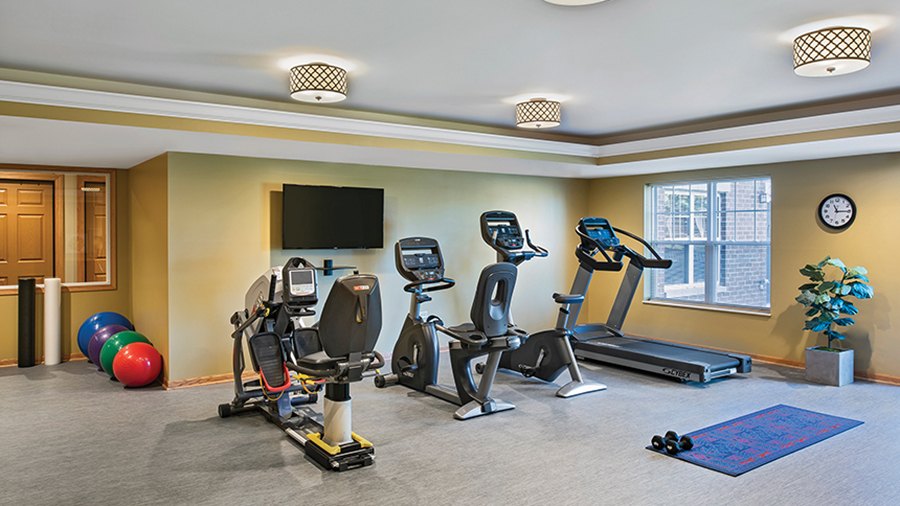 Fitness and exercise room at American House Cedarlake independent and assisted living facility adsf