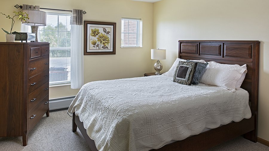 Model bedroom at American House Cedarlake independent and assisted living facility