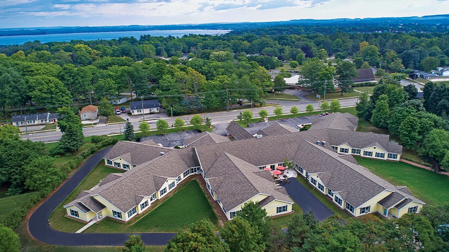 High aerial view of American House Charlevoix senior and assisted living facility