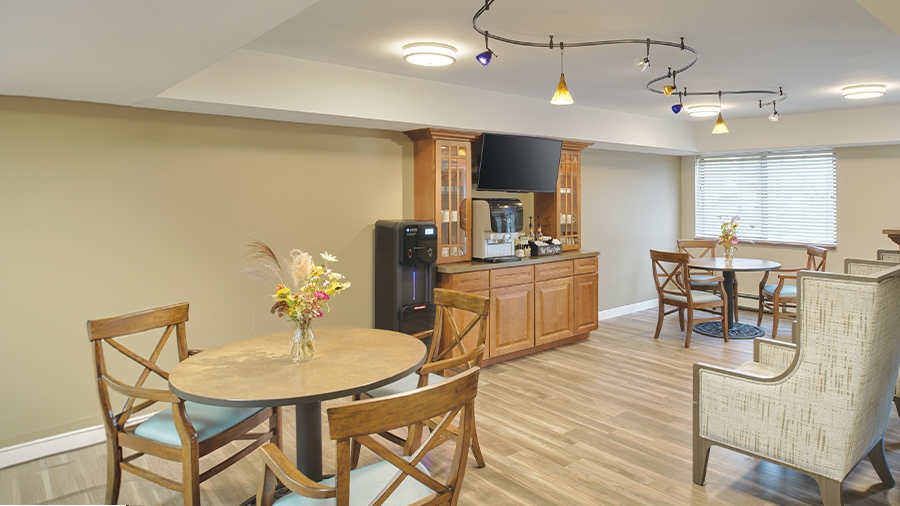 Beverages and seating in the Bistro at American House Grand Blanc assisted living community