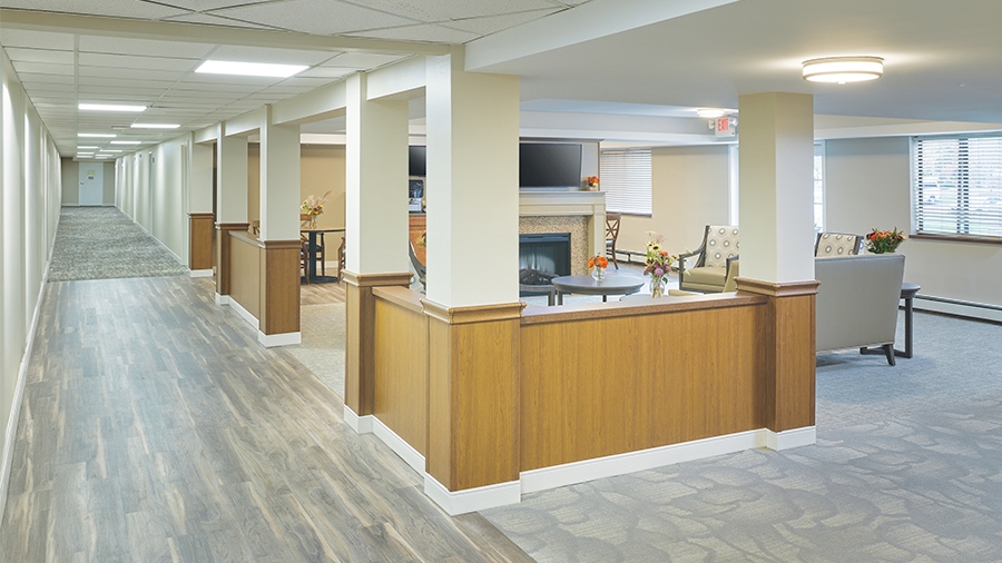 Lobby and corridor at American House Grand Blanc assisted living community