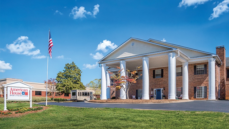 Front driveway, shuttle bus and entrance to American House in Chattanooga assisted living and memory care facility