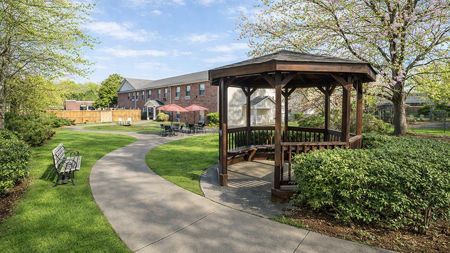 Outdoor gazebo, walking path and patio at American House in Chattanooga assisted living and memory care facility
