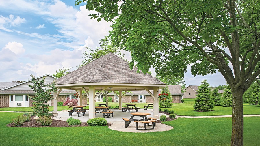 Outdoor gazebo with seating at American House Holland, a retirement community with independent, assisted living and memory care in Holland, MI