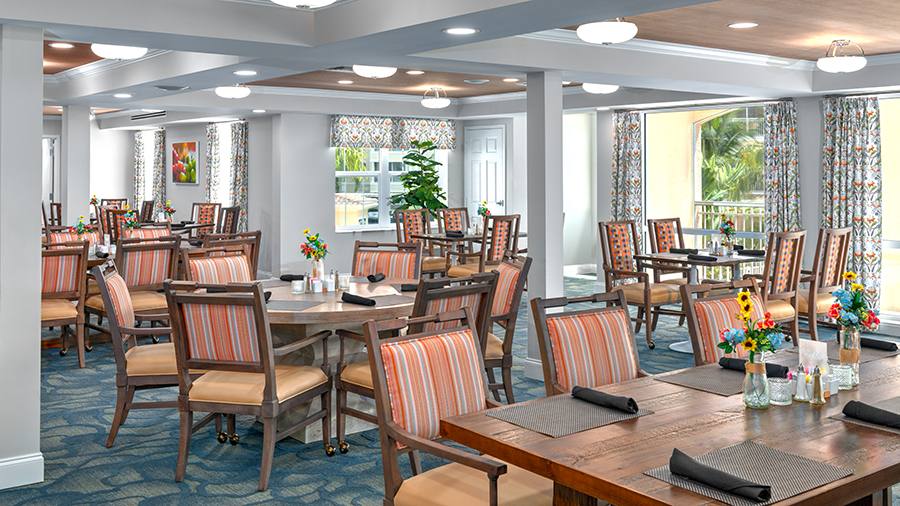 Dining room at American House Bonita Springs assisted living and memory care facility